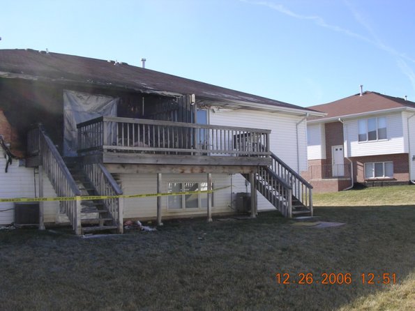 Damaged exterior of fire damaged home in Lincoln NE