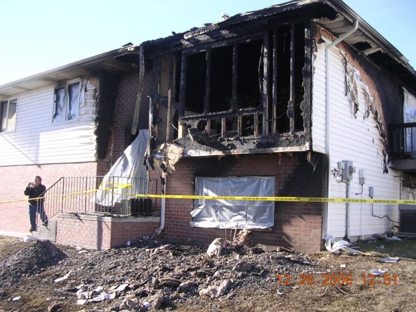 Exterior of severely damaged home from fire in Lincoln NE