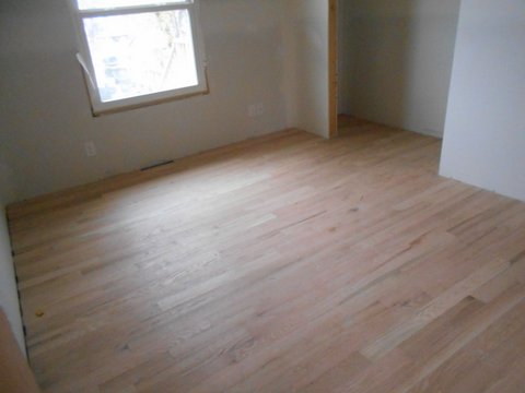 New floors installed after home fire restoration